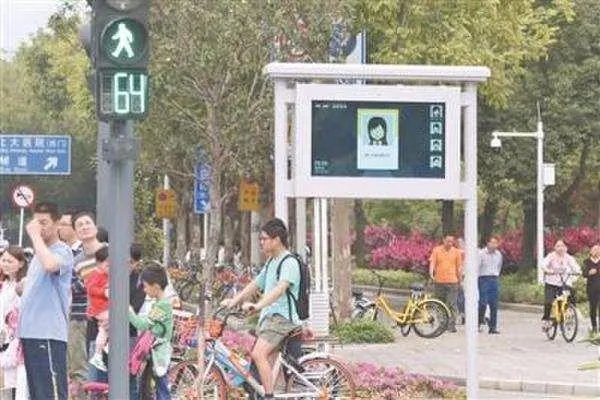 行人闯红灯自动抓拍报警系统的原理是什么?
